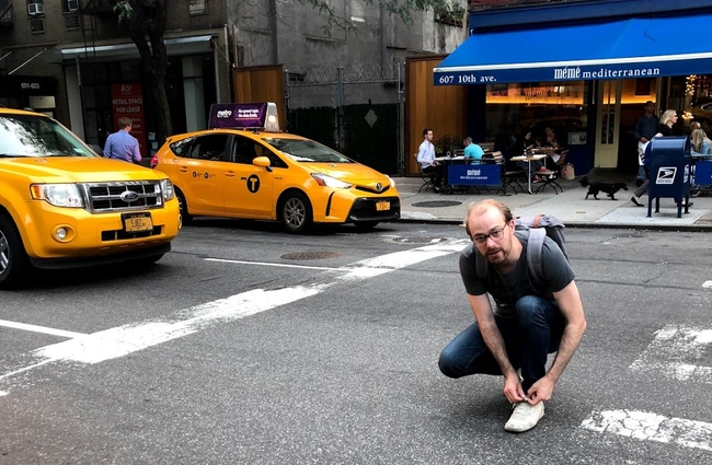 Speeding toward a red light in an NYC taxi cab